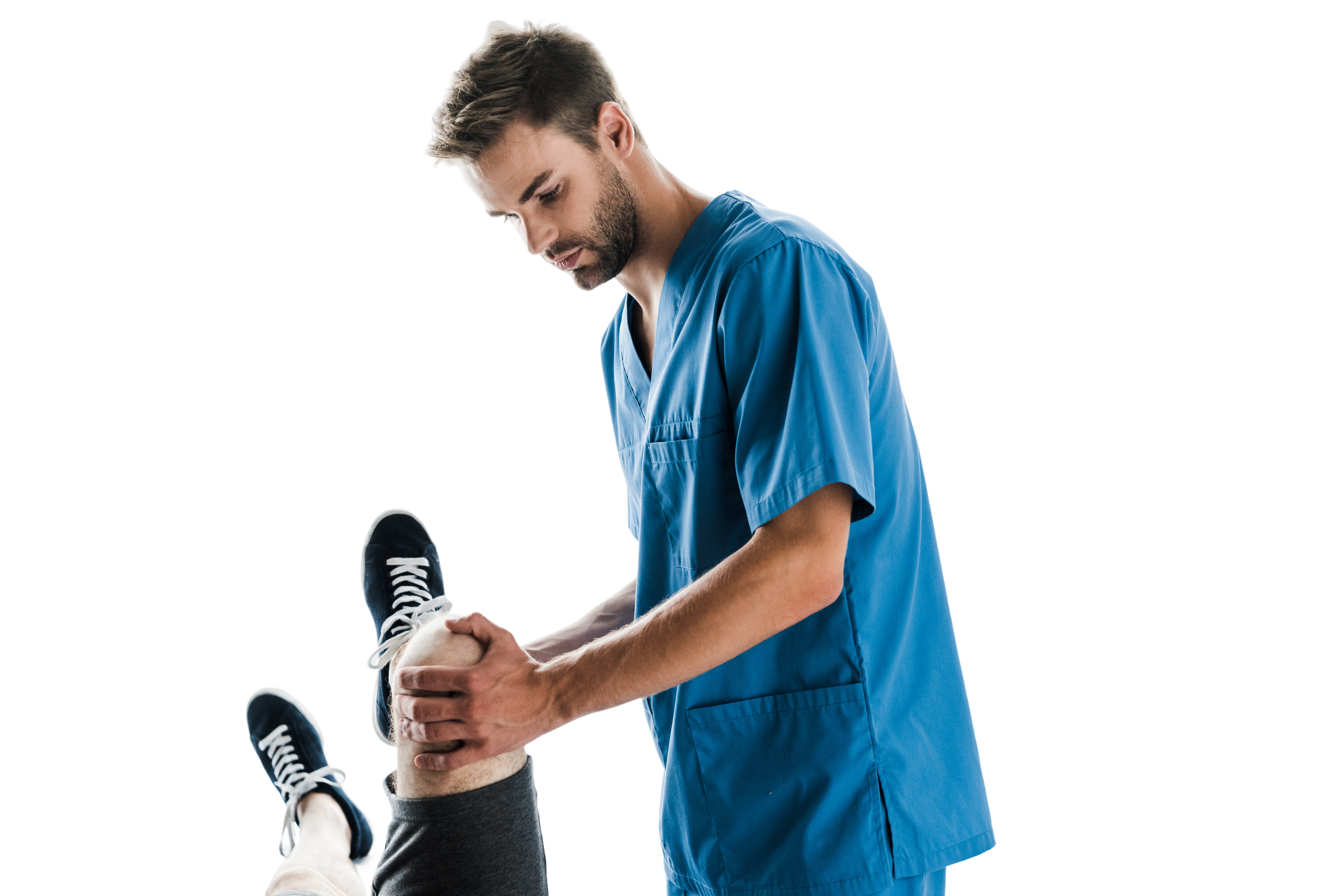 Physical therapist examining a patient's knee